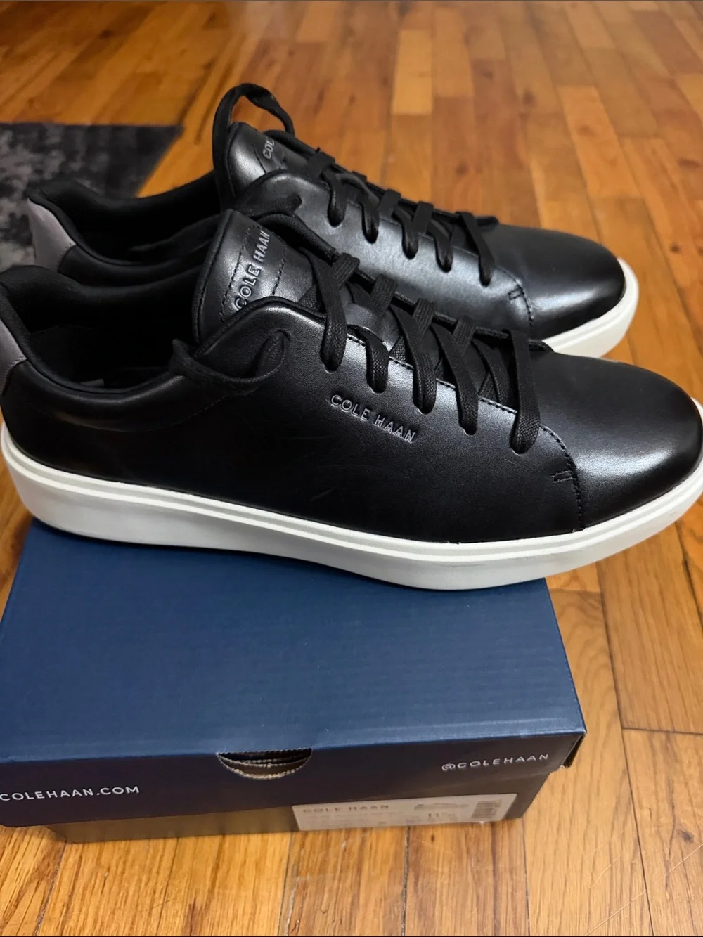 Cole Haan Black Leather Sneakers with White Sole
